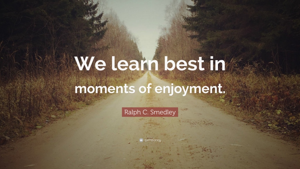 Picture of a road lined by trees on both sides. Quote says: We learn best in moments of enjoyment. By founder of Toastmasters, Dr. Ralph Smedley.